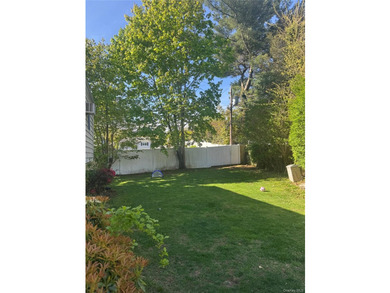 Nestled on a quiet, tree-lined cul-de-sac in Northport, this - photo 35