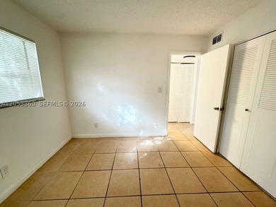 Very nice 2 bedroom/2 bathroom first floor corner unit tile - photo 14