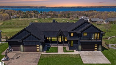 Lake Home For Sale in Williamsburg, Michigan