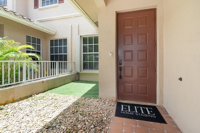 Welcome to this charming 3-bedroom, 2.5-bathroom townhouse - photo 3
