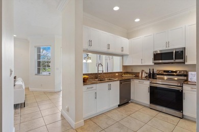 Welcome to this charming 3-bedroom, 2.5-bathroom townhouse - photo 9