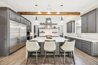 Nestled on a sprawling 1.229-acre lot within the prestigious - photo 12
