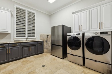 Nestled on a sprawling 1.229-acre lot within the prestigious - photo 23
