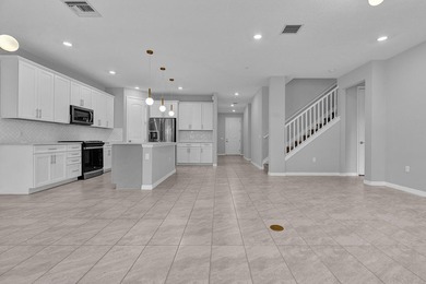 Welcome to this two-story residence located in Fields in Lake - photo 3