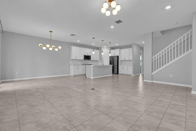 Welcome to this two-story residence located in Fields in Lake - photo 7