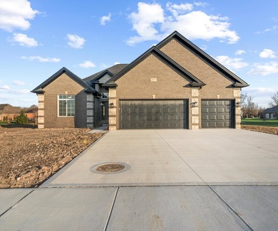 The ''Joshua'' is a ranch style home with upgraded 3 car garage - photo 2