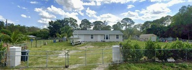 (private lake, pond, creek) Home For Sale in The Acreage Florida
