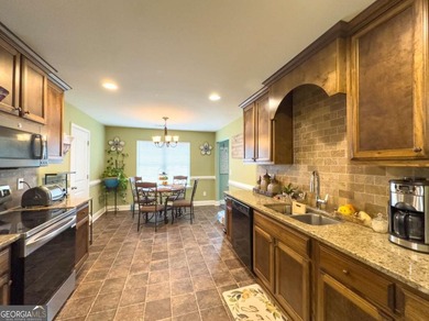 Experience the ultimate in modern ranch-style living with this - photo 2