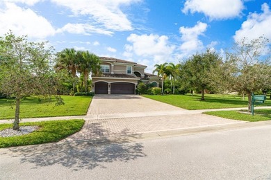 Lake Home For Sale in Palm Beach Gardens, Florida