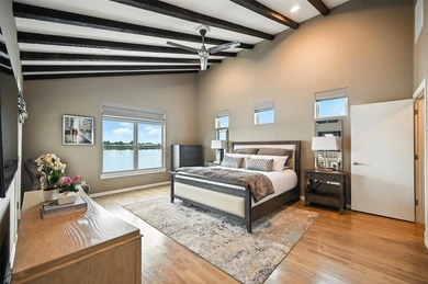 Experience elevated lakefront living in this beautifully - photo 11