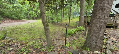 Park your RV or Park Model on your private .35 acre, partially - photo 12