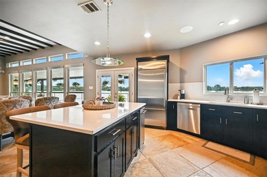 Experience elevated lakefront living in this beautifully - photo 15
