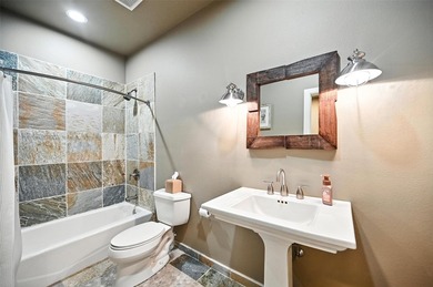 Experience elevated lakefront living in this beautifully - photo 21