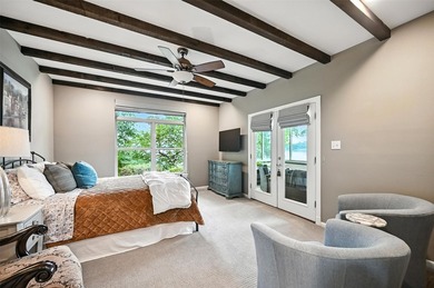 Experience elevated lakefront living in this beautifully - photo 22