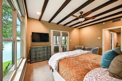 Experience elevated lakefront living in this beautifully - photo 23