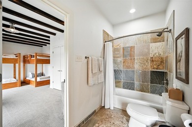 Experience elevated lakefront living in this beautifully - photo 25