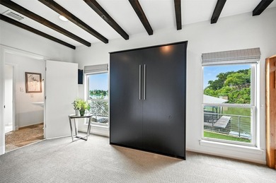 Experience elevated lakefront living in this beautifully - photo 29