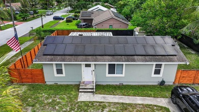 Welcome to this charming three-bedroom, two-bathroom - photo 35