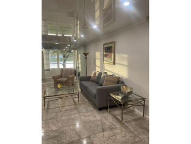 Lake Condo For Sale in Coconut Creek, Florida