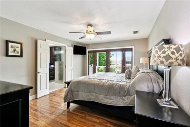 A true waterfront paradise on a rare triple lot in Venetian