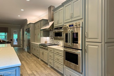Discover this exceptional residence in The Highlands, a premier - photo 14