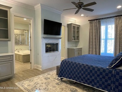 Discover this exceptional residence in The Highlands, a premier - photo 18