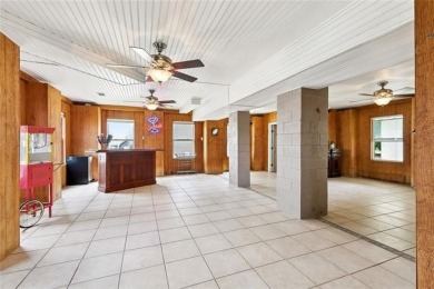 A true waterfront paradise on a rare triple lot in Venetian