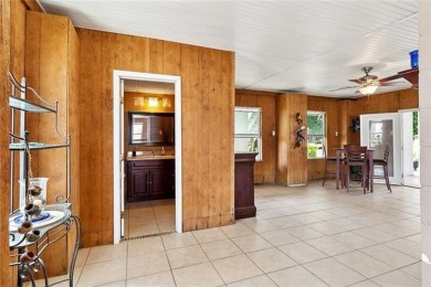 A true waterfront paradise on a rare triple lot in Venetian