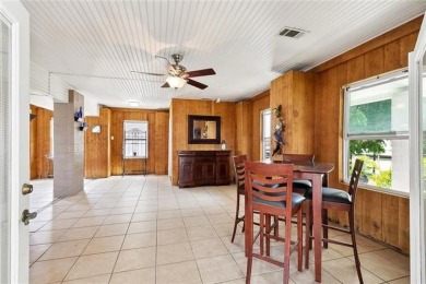 A true waterfront paradise on a rare triple lot in Venetian