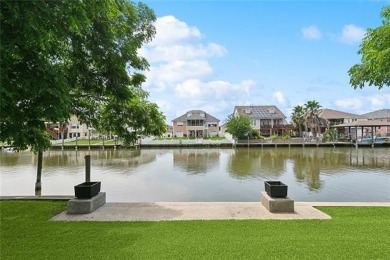 A true waterfront paradise on a rare triple lot in Venetian