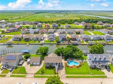 A true waterfront paradise on a rare triple lot in Venetian