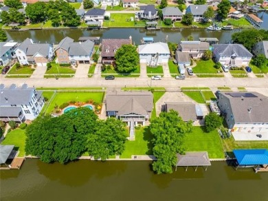 A true waterfront paradise on a rare triple lot in Venetian