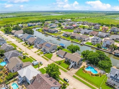 A true waterfront paradise on a rare triple lot in Venetian