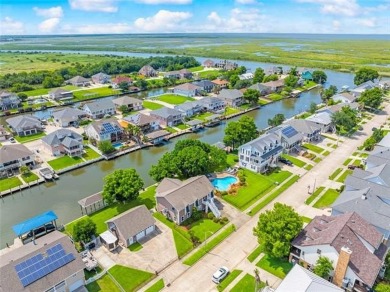 A true waterfront paradise on a rare triple lot in Venetian