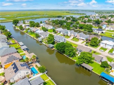 A true waterfront paradise on a rare triple lot in Venetian