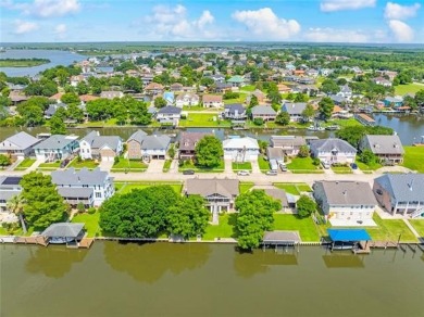 A true waterfront paradise on a rare triple lot in Venetian