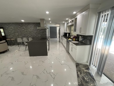 Immaculate MOVE IN READY! 5 bed/ 2baths house in Coral Springs - photo 9