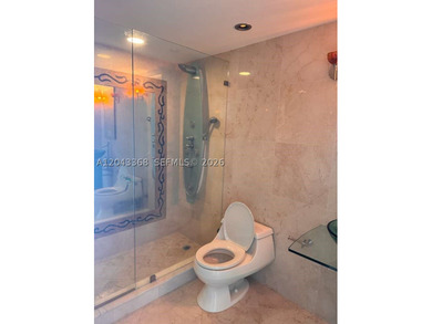 Beach's most sought-after boutique oceanfront buildings! In the - photo 11