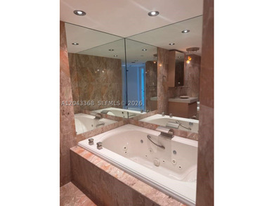 Beach's most sought-after boutique oceanfront buildings! In the - photo 16