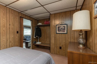This charming four-unit resort on Lake Emily boasts 2,276 square - photo 11