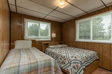 This charming four-unit resort on Lake Emily boasts 2,276 square - photo 12