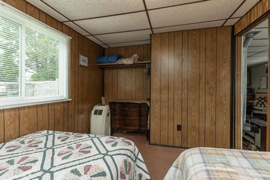 This charming four-unit resort on Lake Emily boasts 2,276 square - photo 13