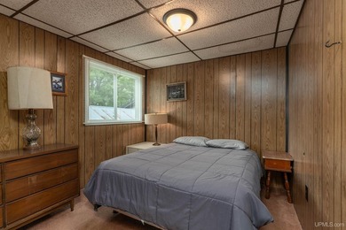 This charming four-unit resort on Lake Emily boasts 2,276 square - photo 17