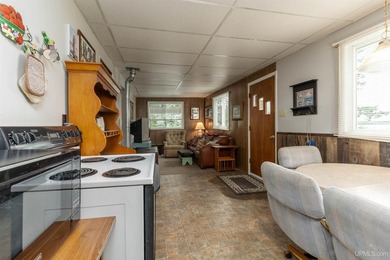 This charming four-unit resort on Lake Emily boasts 2,276 square - photo 18