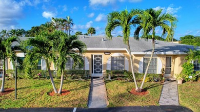 RENOVATED, MOVE-IN READY VILLA. Experience effortless Florida - photo 19