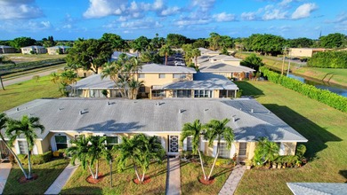 RENOVATED, MOVE-IN READY VILLA. Experience effortless Florida - photo 20