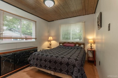 This charming four-unit resort on Lake Emily boasts 2,276 square - photo 20