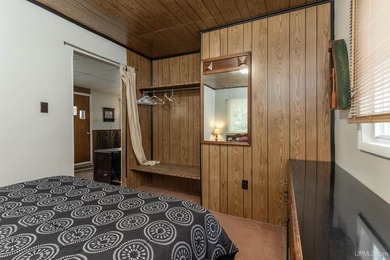 This charming four-unit resort on Lake Emily boasts 2,276 square - photo 21