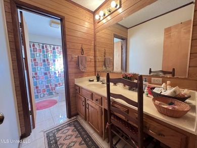 Prime Golf Course Living in Diamondhead | Wake up to sweeping - photo 23