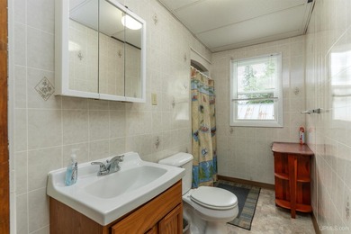 This charming four-unit resort on Lake Emily boasts 2,276 square - photo 24